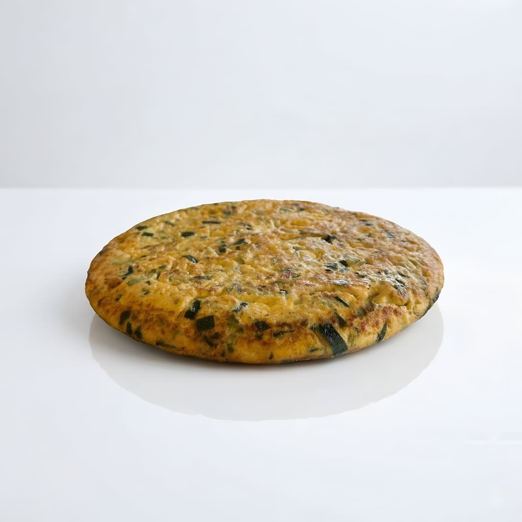 Tortilla de patata, calabacín y bacalao